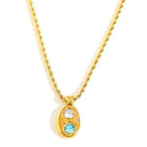 SMALL OVAL PENDANT WITH BLUE AND CLEAR CZ ON A ROPE CHAIN VERY STRIKING